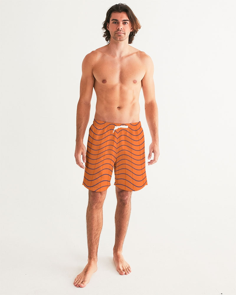 Men's Pumpkin Swim Trunks — bold all-over print by AmbiVirile, back view