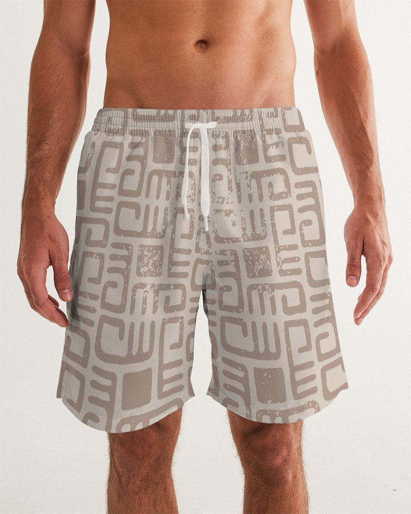 Men's Beige Tribes Swim Trunks — bold all-over print by AmbiVirile, front view