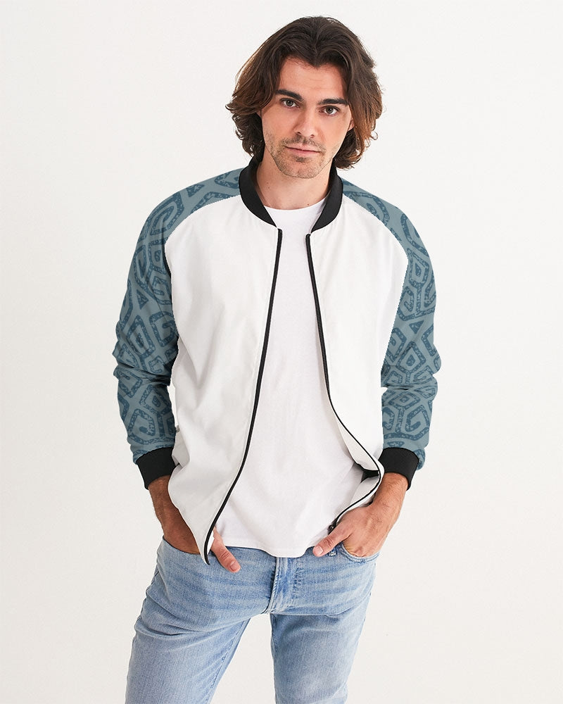 Men's Teal Tribal Cloth Bomber Jacket — bold all-over print by AmbiVirile, front view