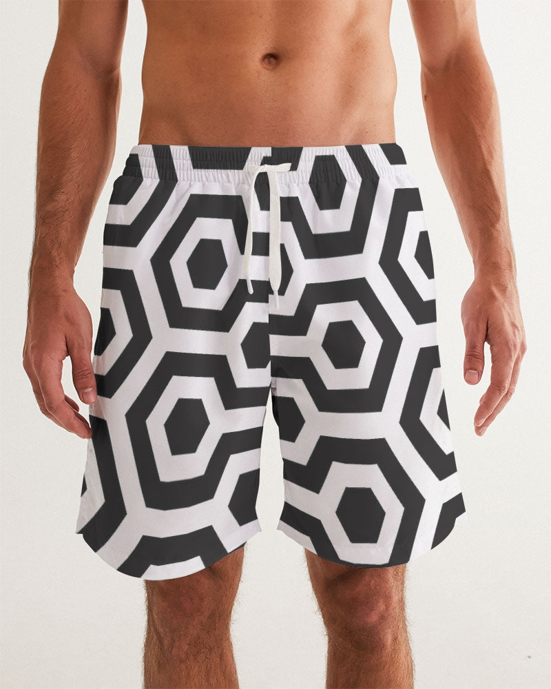 Men's Black Matter Swim Trunks — bold all-over print by AmbiVirile, front view