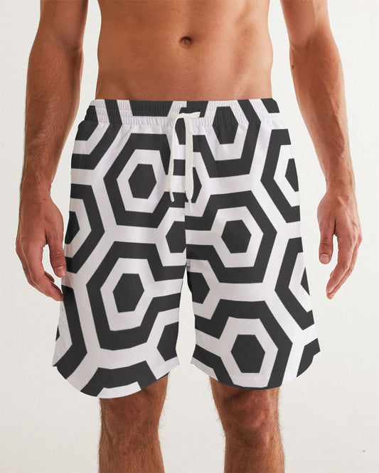 Men's Black Matter Swim Trunks — bold all-over print by AmbiVirile, front view