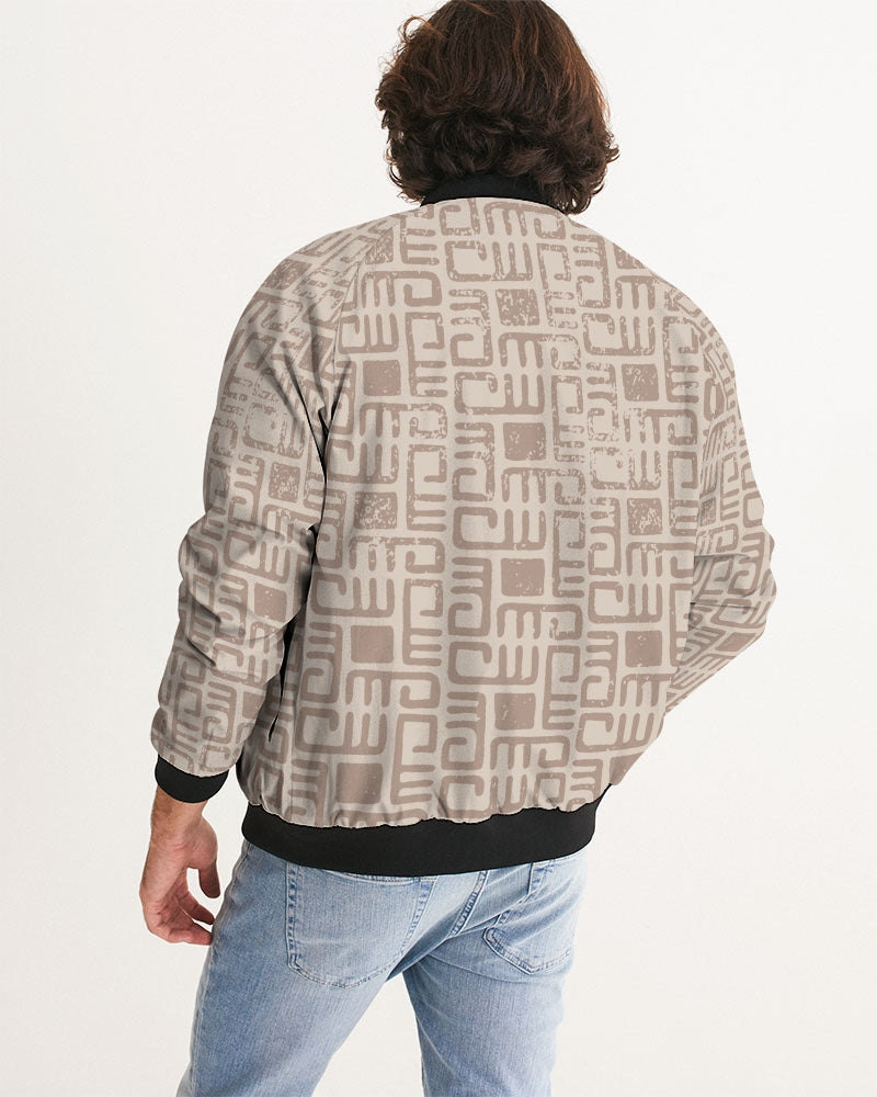 Men's Beige Tribes Bomber Jacket — bold all-over print by AmbiVirile, detail view