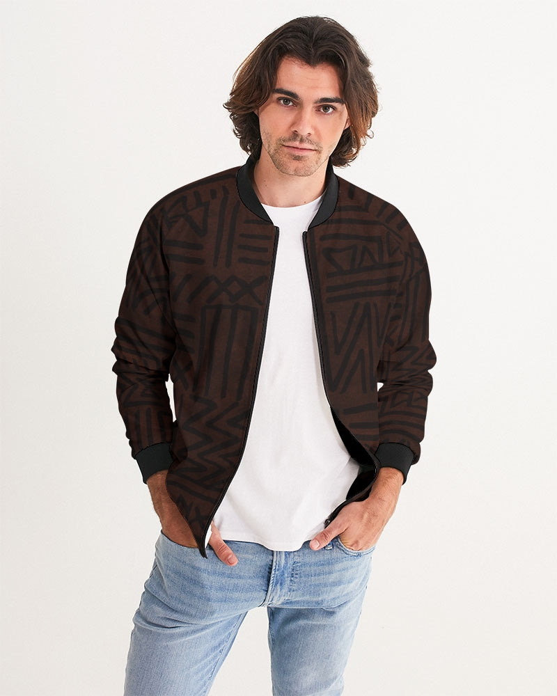 Men's African Strength Bomber Jacket — bold all-over print by AmbiVirile, front view