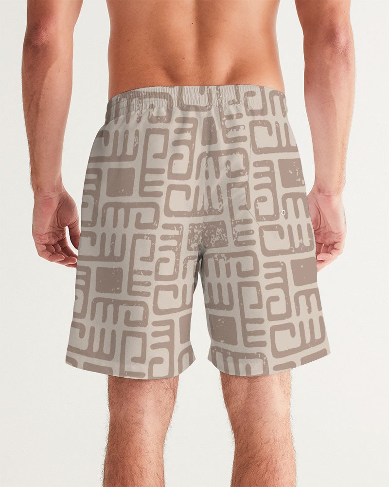 Men's Beige Tribes Swim Trunks — bold all-over print by AmbiVirile, detail view
