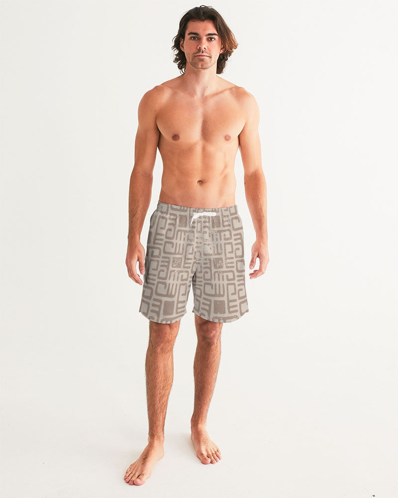 Men's Beige Tribes Swim Trunks — bold all-over print by AmbiVirile, back view