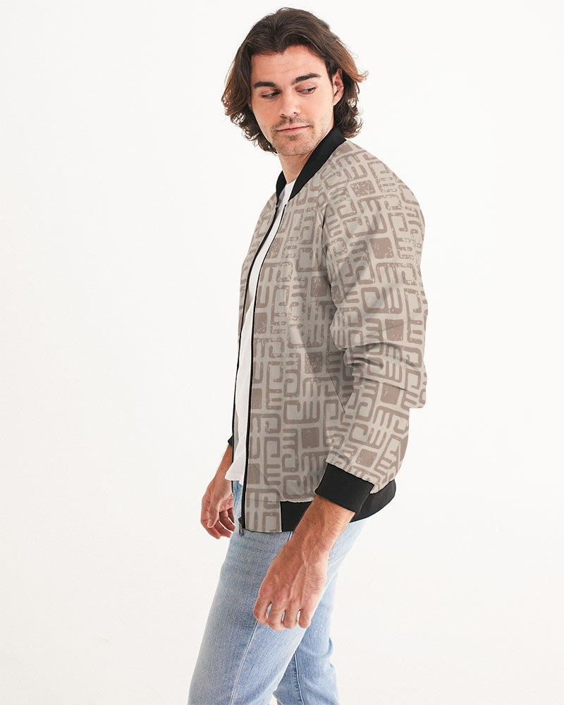 Men's Beige Tribes Bomber Jacket — bold all-over print by AmbiVirile, side view